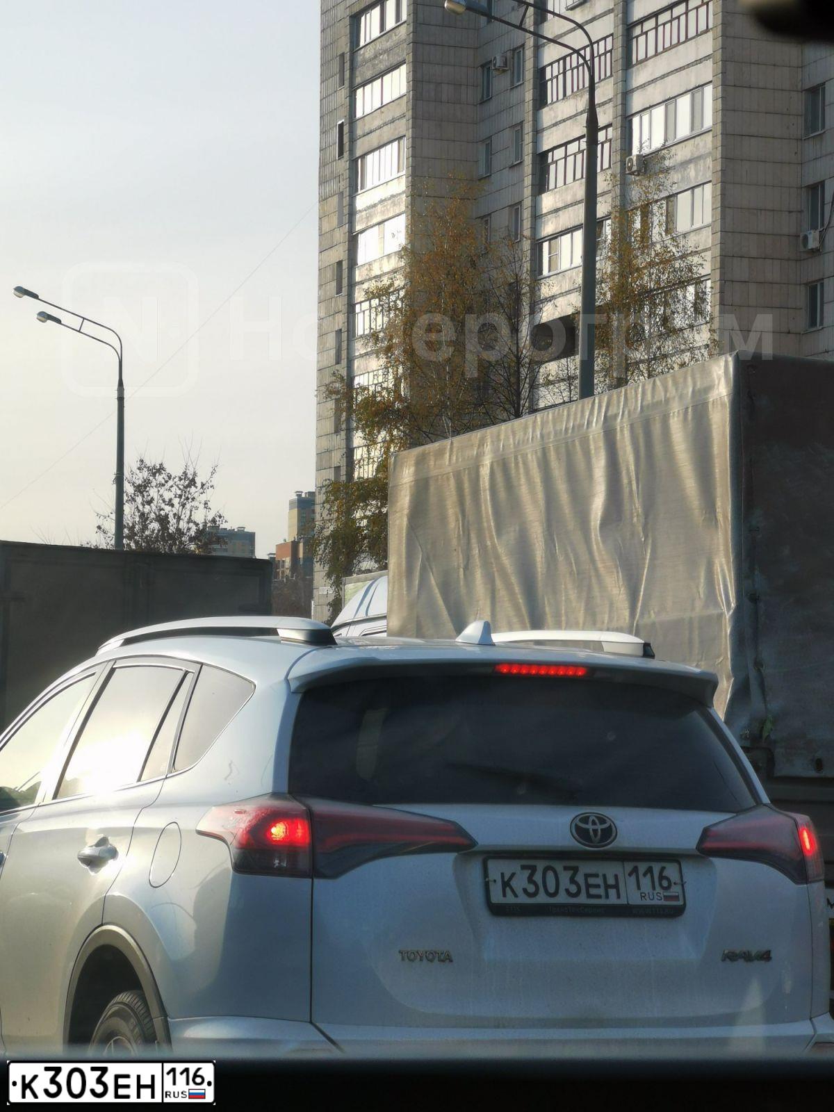 Фото автомобиля VOLKSWAGEN TIGUAN, 2011 — госномер К303ЕН116. Цвет: ЧЕРНЫЙ