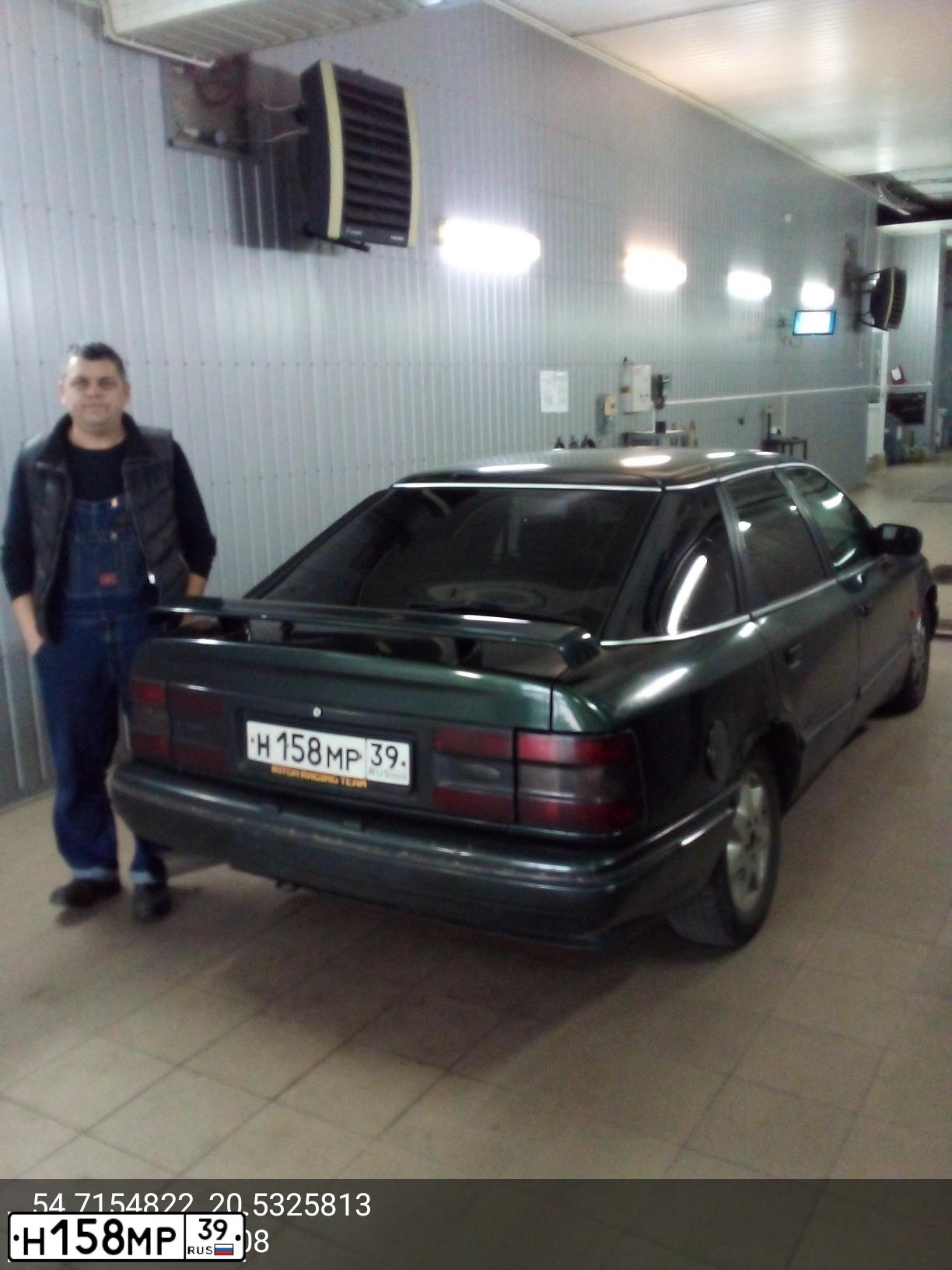 Фото автомобиля FORD SCORPIO, 1994 — госномер Н158МР39. Цвет: ЗЕЛЕНЫЙ