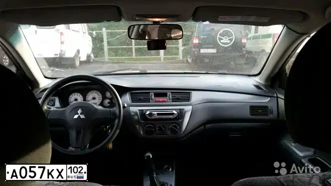 Фото автомобиля MITSUBISHI LANCER, 2007 — госномер А057КХ102. Цвет: СИНИЙ