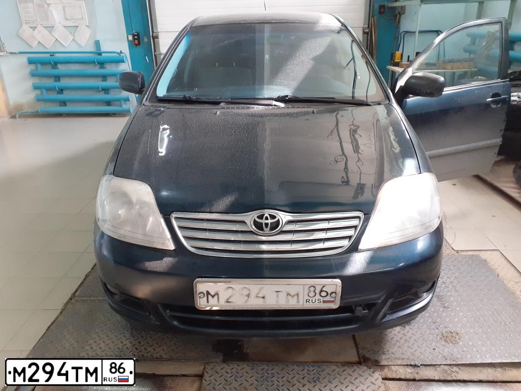 Фото автомобиля TOYOTA COROLLA, 2004 — госномер Н097ОУ196. Цвет: Темно-зеленый