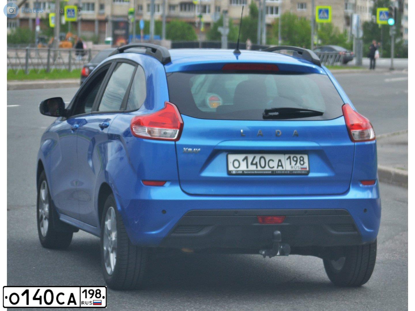 Фото автомобиля LADA XRAY, 2021 — госномер О140СА198. Цвет: СЕРЕБРИСТЫЙ ТЕМНО-СИНИЙ