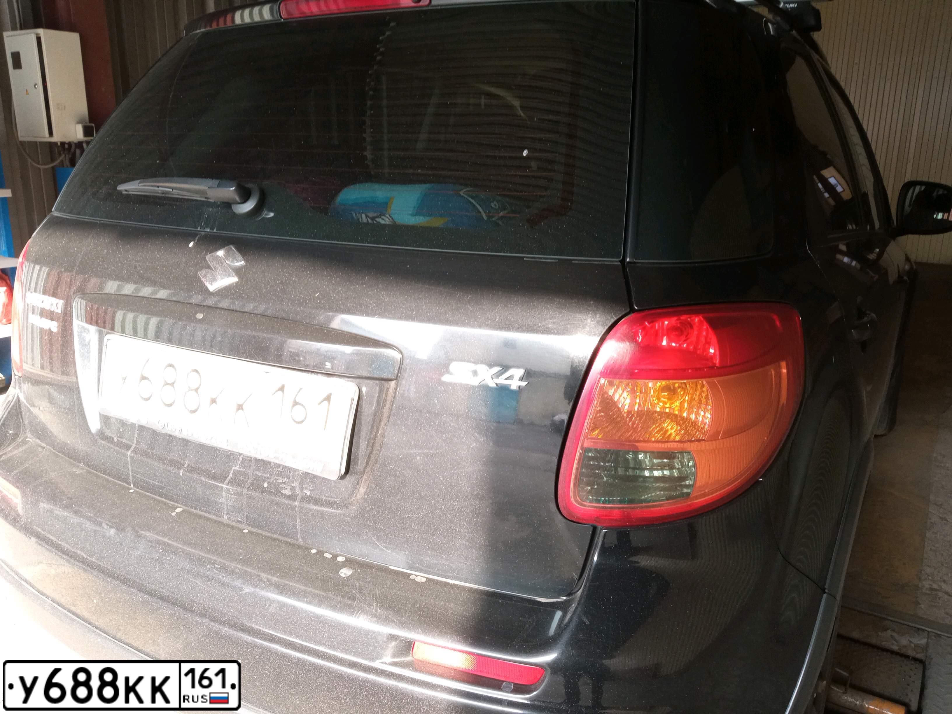 Фото автомобиля SUZUKI SX 4, 2010 — госномер У688КК161. Цвет: ЧЕРНЫЙ
