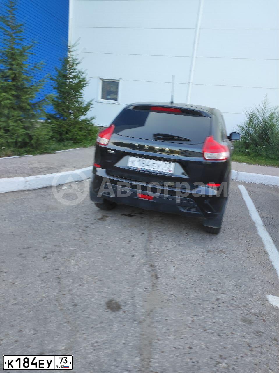 Фото автомобиля LADA XRAY, 2018 — госномер К184ЕУ73. Цвет: ЧЕРНЫЙ