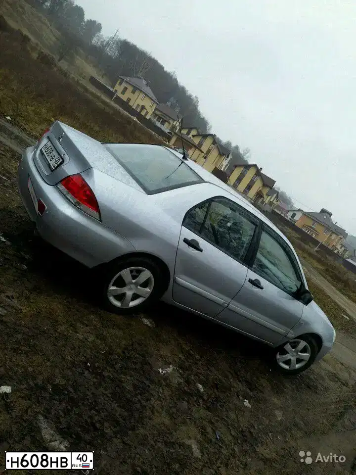 Фото автомобиля MITSUBISHI LANCER, 2004 — госномер Р395УВ40