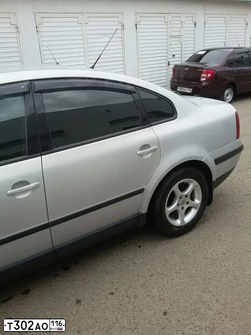 Фото автомобиля LADA 2190 GRANTA, 2013 — госномер М814АТ702. Цвет: ТЕМНО-ВИШНЕВЫЙ