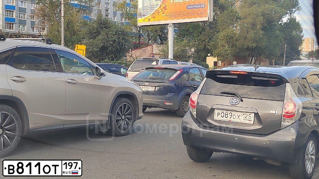 Фото автомобиля BMW X1, 2011 — госномер В416ЕЕ252. Цвет: синий