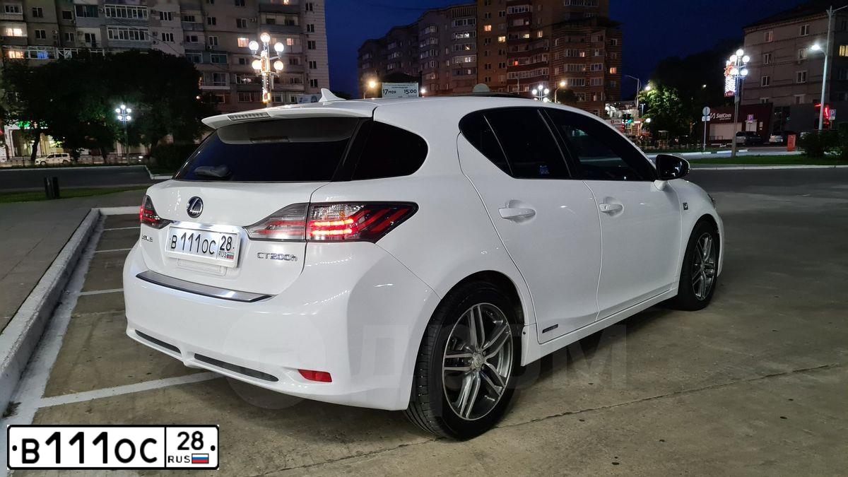 Фото автомобиля HYUNDAI IX35, 2010 — госномер Р018ВЕ28. Цвет: ЧЕРНЫЙ