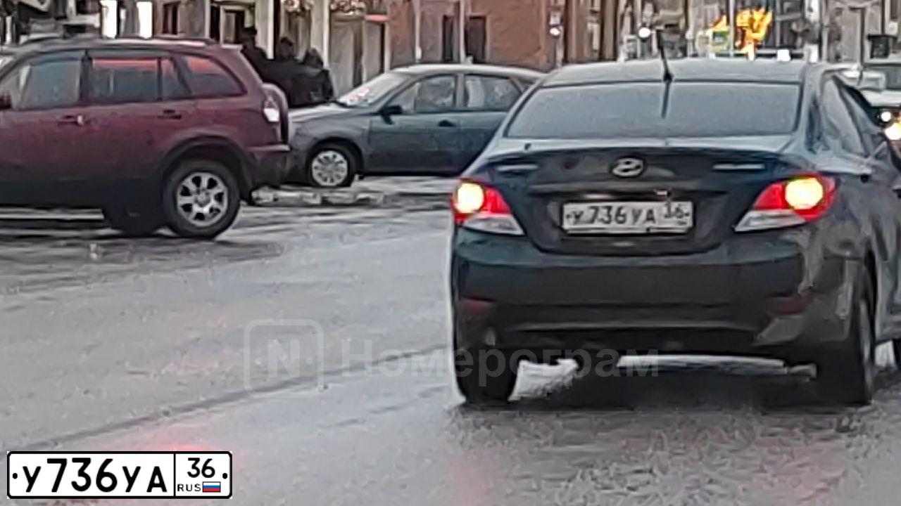 Фото автомобиля HYUNDAI SOLARIS, 2012 — госномер У736УА36. Цвет: ЧЕРНЫЙ