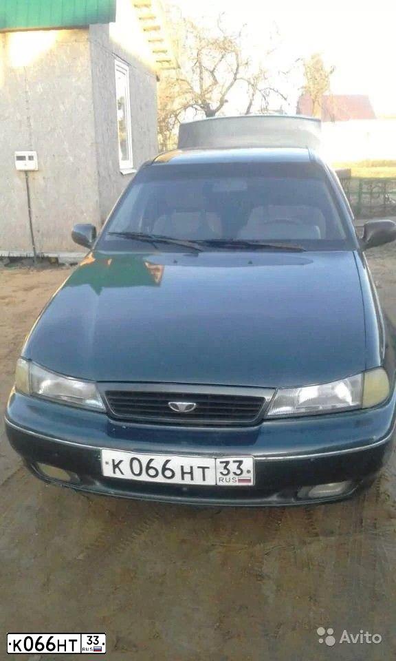 Фото автомобиля DAEWOO NEXIA, 2002 — госномер В234НР33. Цвет: МАСЛИНОВЫЙ