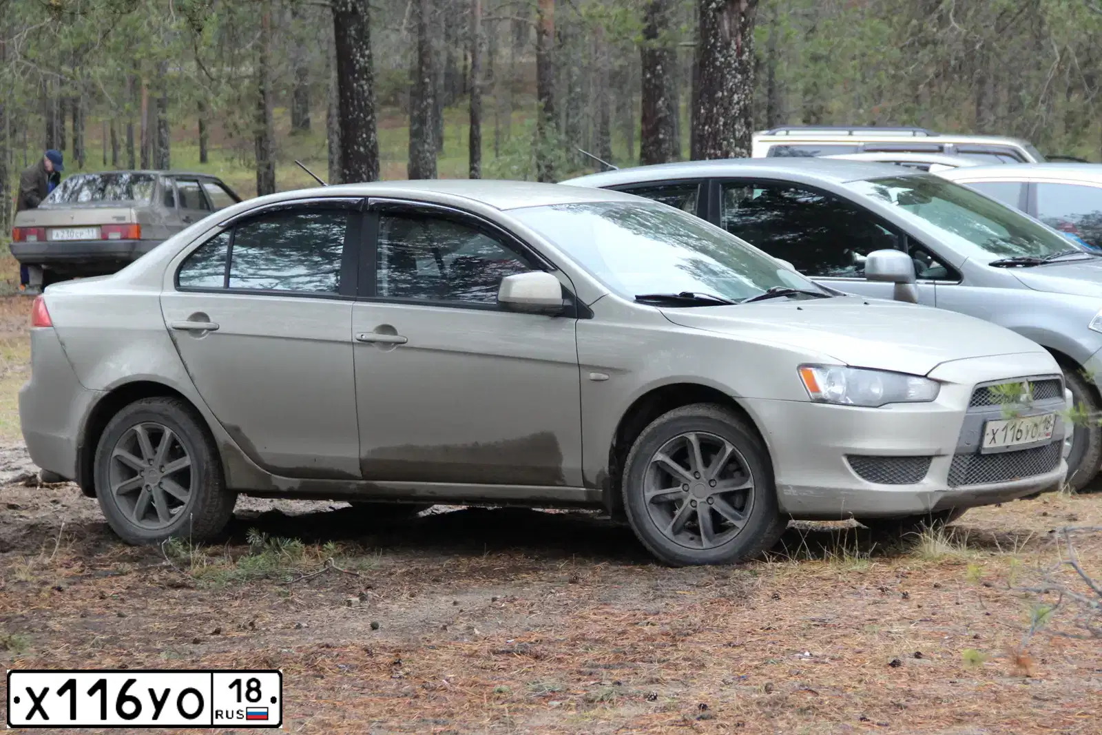 Фото автомобиля MITSUBISHI LANCER, 2008 — госномер Х116УО18. Цвет: БЕЖЕВЫЙ