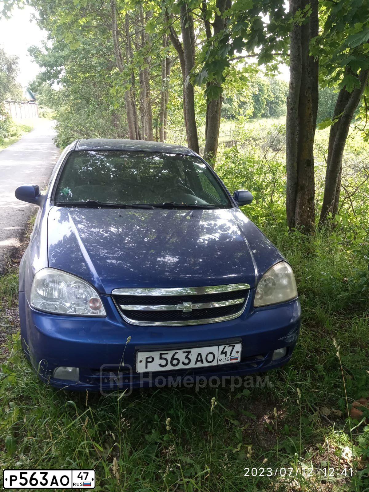 Фото автомобиля CHEVROLET LACETTI, 2008 — госномер Р563АО47. Цвет: синий