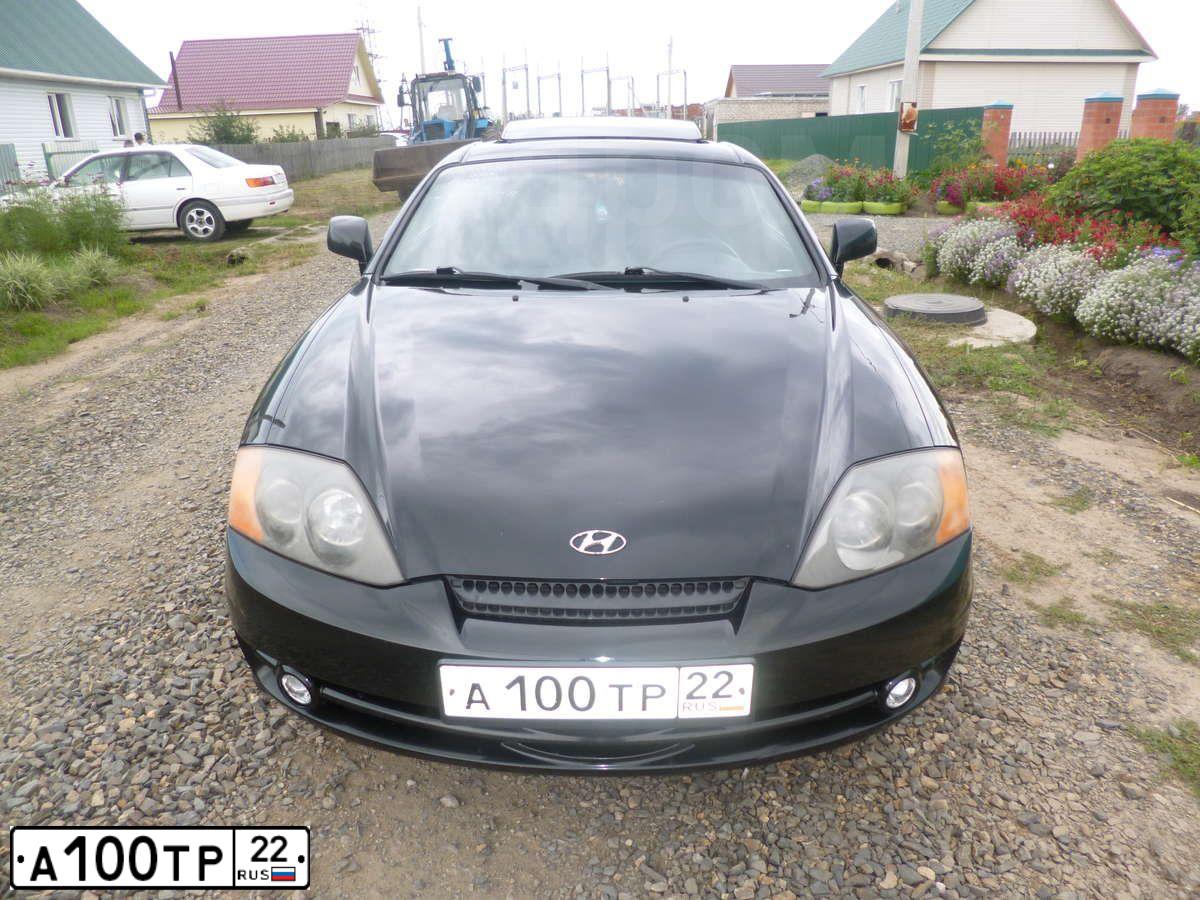 Фото автомобиля HYUNDAI TIBURON, 2003 — госномер А100ТР22. Цвет: ЧЕРНЫЙ