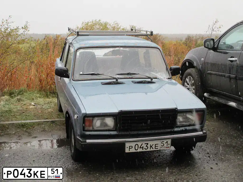 Фото автомобиля LADA 2107, 1984 — госномер Р043КЕ51. Цвет: СЕРО-ГОЛУБОЙ