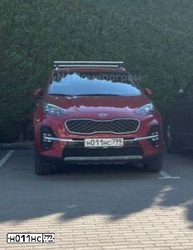 Фото автомобиля KIA SPORTAGE, 2019 — госномер Н011НС799. Цвет: КРАСНЫЙ