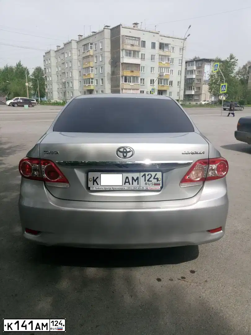 Фото автомобиля FORD FOCUS, 2008 — госномер Н208ВХ124. Цвет: ФИОЛЕТОВЫЙ