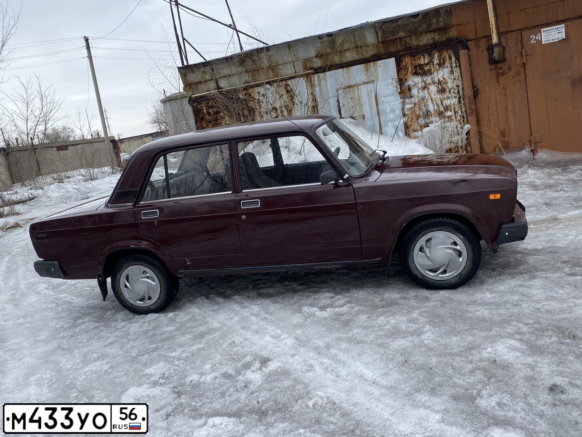 Фото автомобиля LADA 2107, 2005 — госномер Е745ТК156. Цвет: ТЕМНО-ВИШНЕВЫЙ