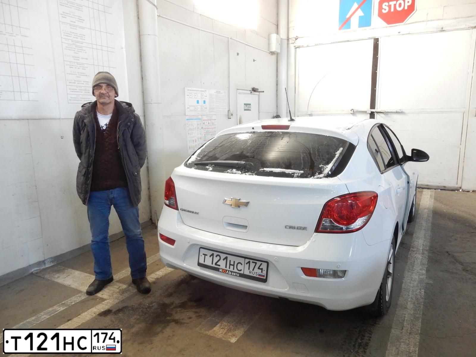 Фото автомобиля RENAULT LOGAN, 2011 — госномер Т121НС174. Цвет: ЧЕРНЫЙ
