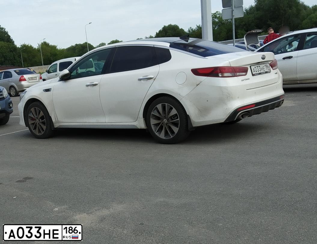 Фото автомобиля KIA MAGENTIS / OPTIMA, 2017 — госномер А033НЕ186. Цвет: БЕЛЫЙ