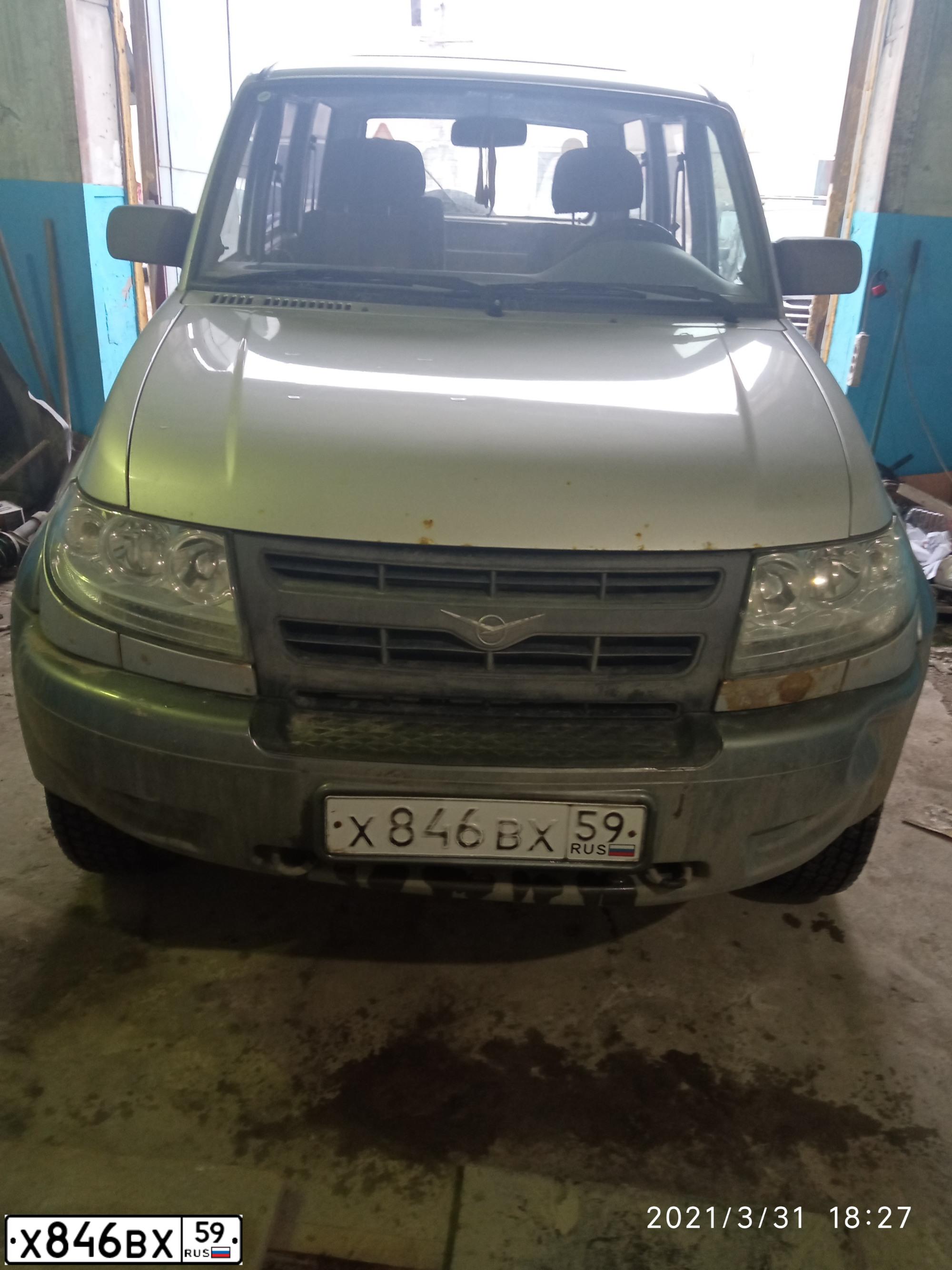 Фото автомобиля UAZ 3163 PATRIOT, 2007 — госномер Т232НМ777. Цвет: АМУЛЕТ МЕТАЛЛИК