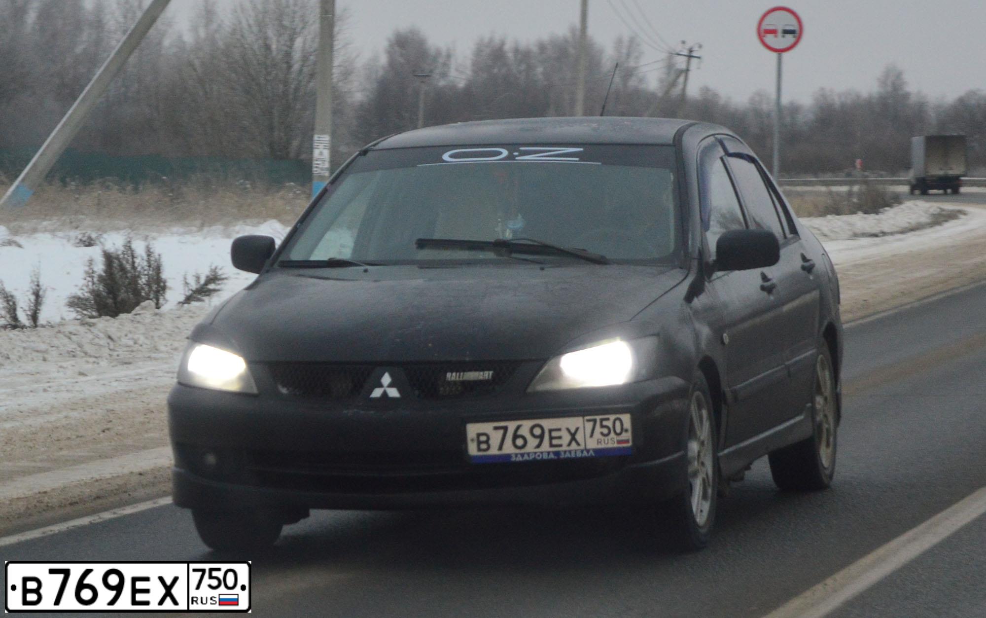 Фото автомобиля MITSUBISHI LANCER, 2007 — госномер М161МК136. Цвет: ЧЕРНЫЙ