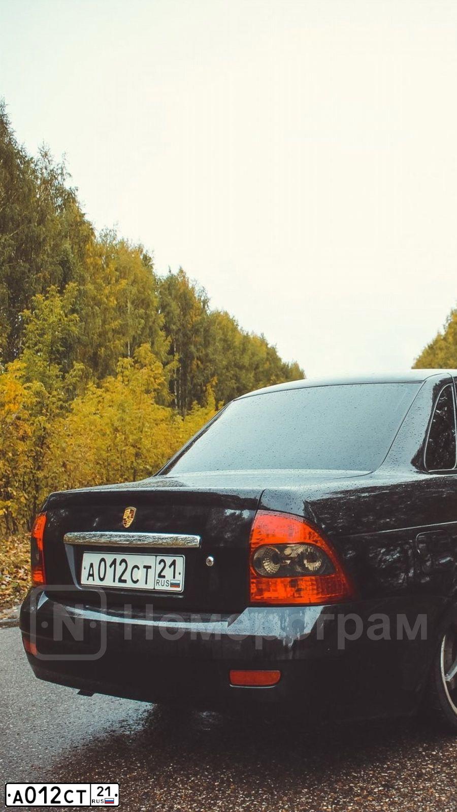 Фото автомобиля LADA 2170 PRIORA, 2010 — госномер А012СТ21. Цвет: СИНЕ-ЧЕРНЫЙ