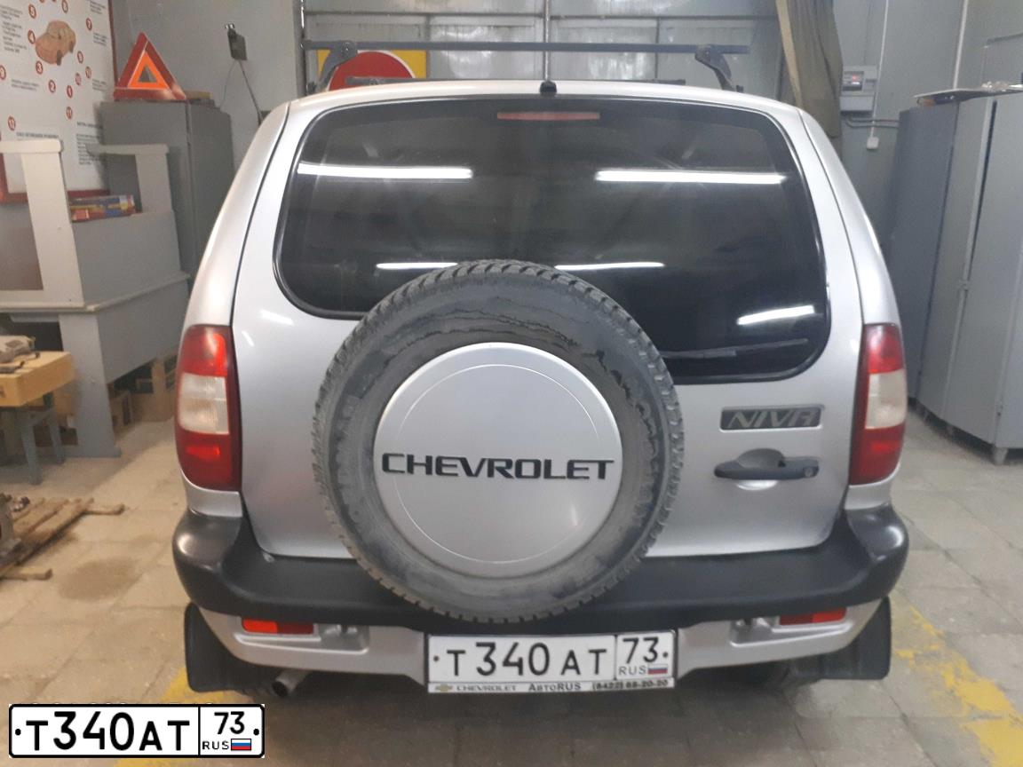 Фото автомобиля CHEVROLET NIVA, 2004 — госномер Т340АТ73. Цвет: СВЕТЛО-СЕРЕБРИСТЫЙ МЕТАЛЛ