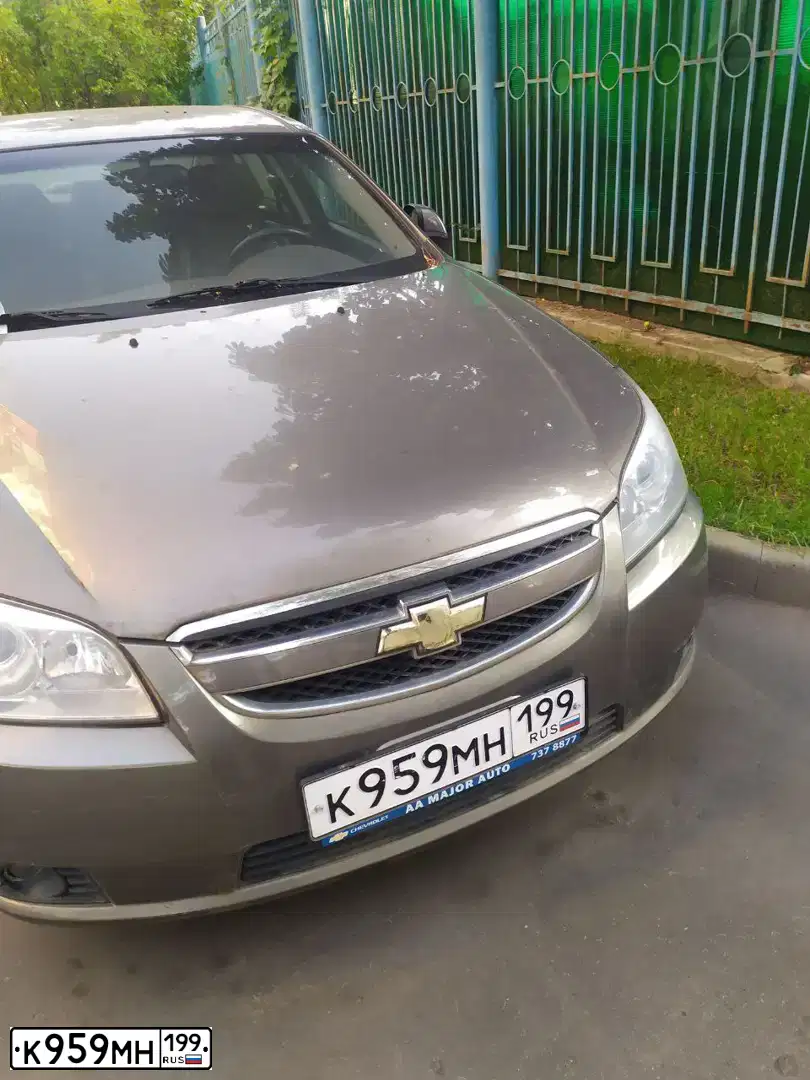 Фото автомобиля CHEVROLET EPICA, 2008 — госномер К484ХХ13. Цвет: Серый