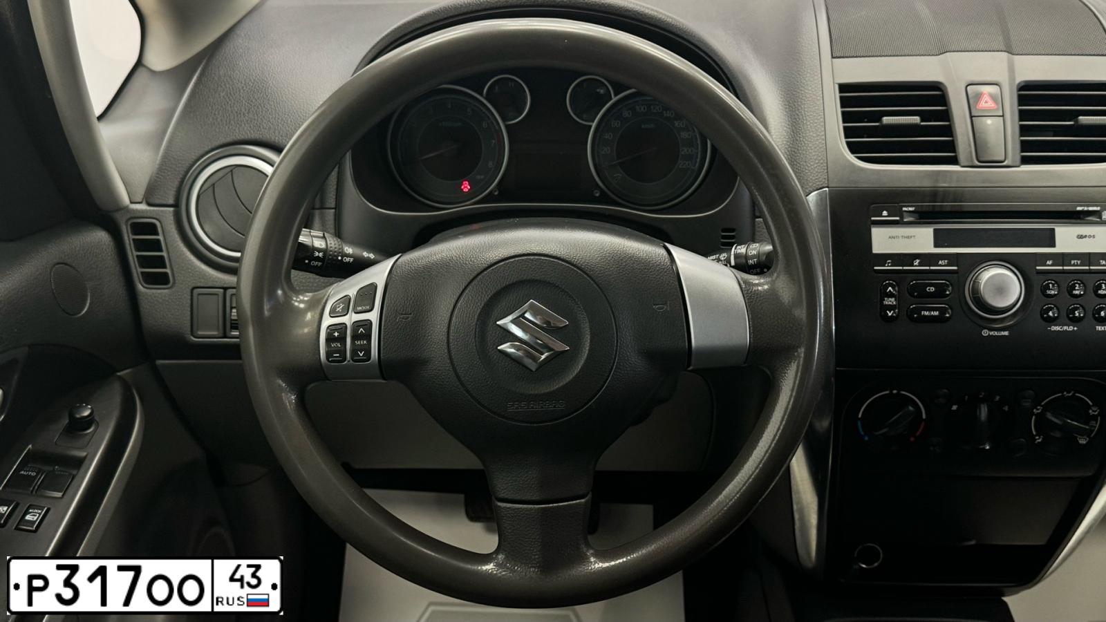 Фото автомобиля SUZUKI SX 4, 2013 — госномер Р317ОО43. Цвет: ЧЕРНИЧНЫЙ