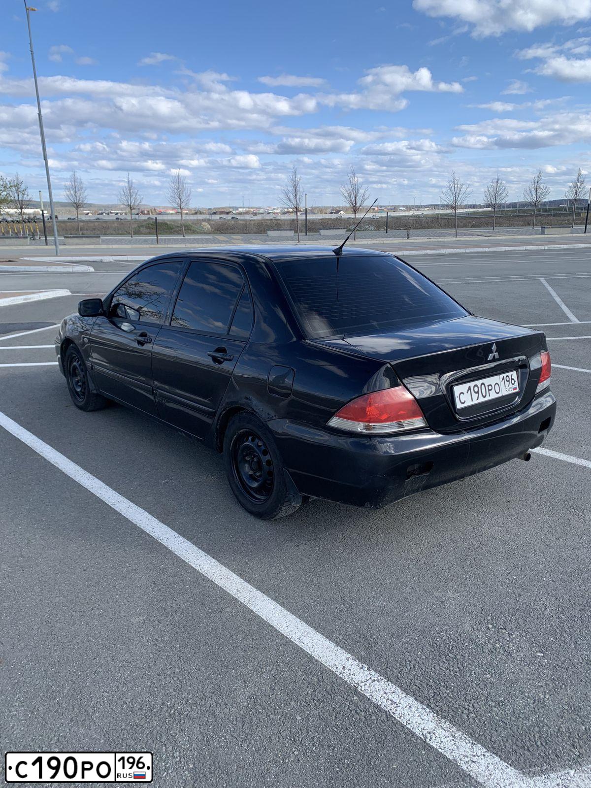 Фото автомобиля MITSUBISHI LANCER, 2006 — госномер Х532АТ196. Цвет: ЧЕРНЫЙ