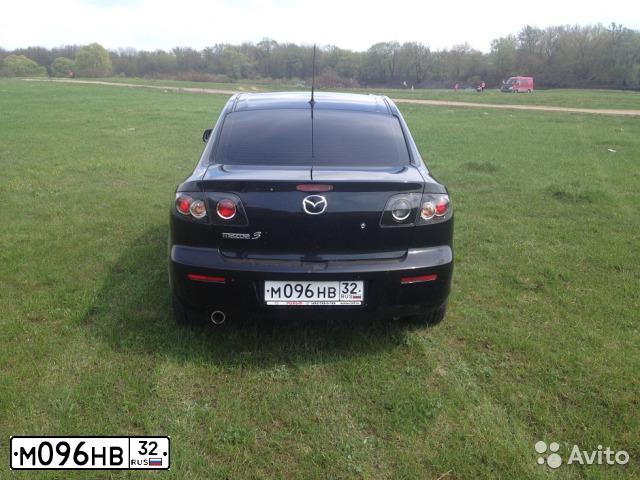 Фото автомобиля MAZDA 3, 2008 — госномер Е101НМ197. Цвет: ЧЕРНЫЙ