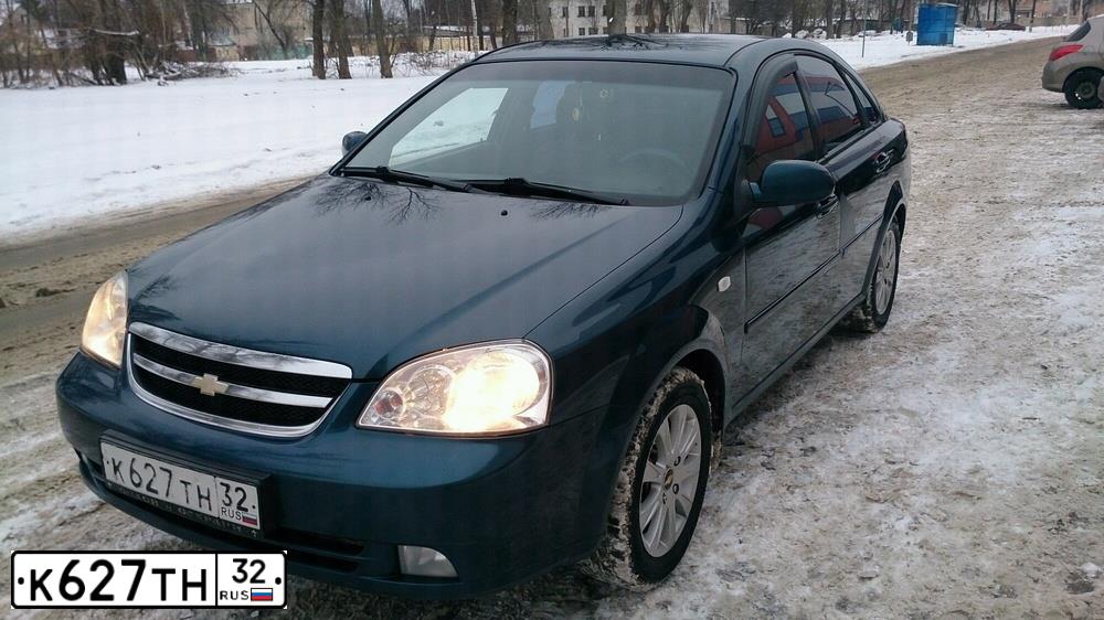 Фото автомобиля CHEVROLET LACETTI, 2008 — госномер Е400СУ57. Цвет: синий
