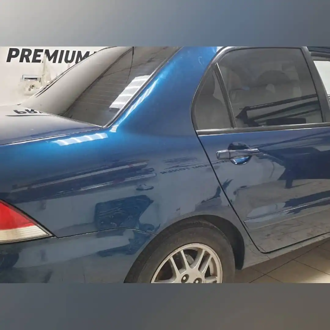 Фото автомобиля MITSUBISHI LANCER, 2006 — госномер К641СО21. Цвет: синий