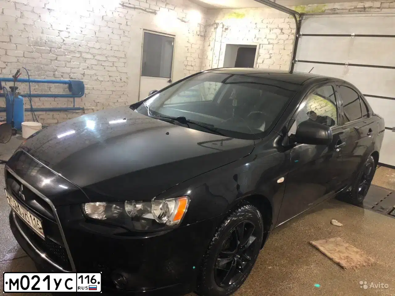 Фото автомобиля CHEVROLET CRUZE, 2009 — госномер Е310РК156. Цвет: Белый