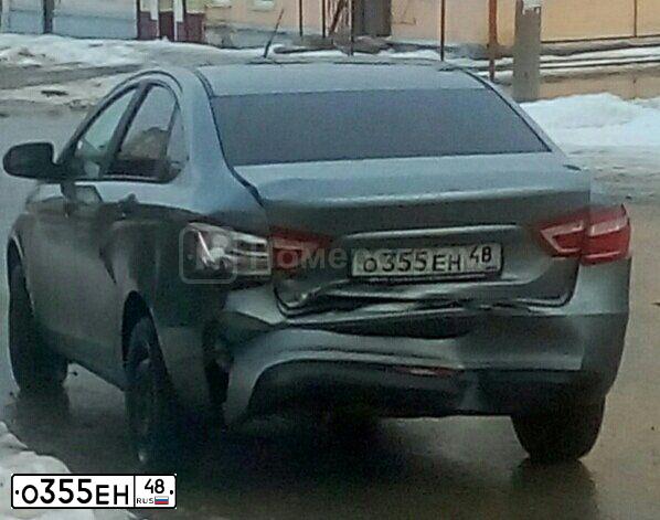 Фото автомобиля LADA VESTA, 2018 — госномер Р155СР48. Цвет: СЕРЫЙ