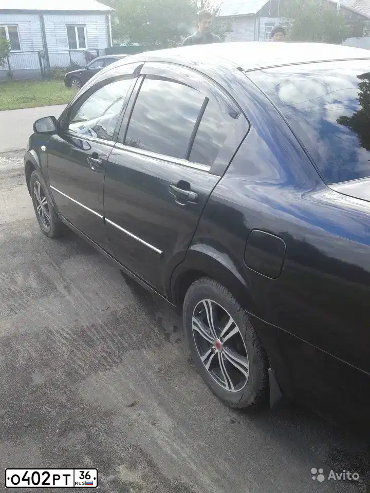 Фото автомобиля CHERY FORA /A21/, 2008 — госномер Е131АВ761. Цвет: ЧЕРНЫЙ