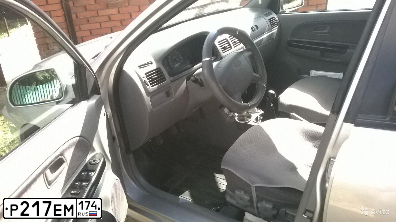 Фото автомобиля KIA RIO, 2004 — госномер О825КО774