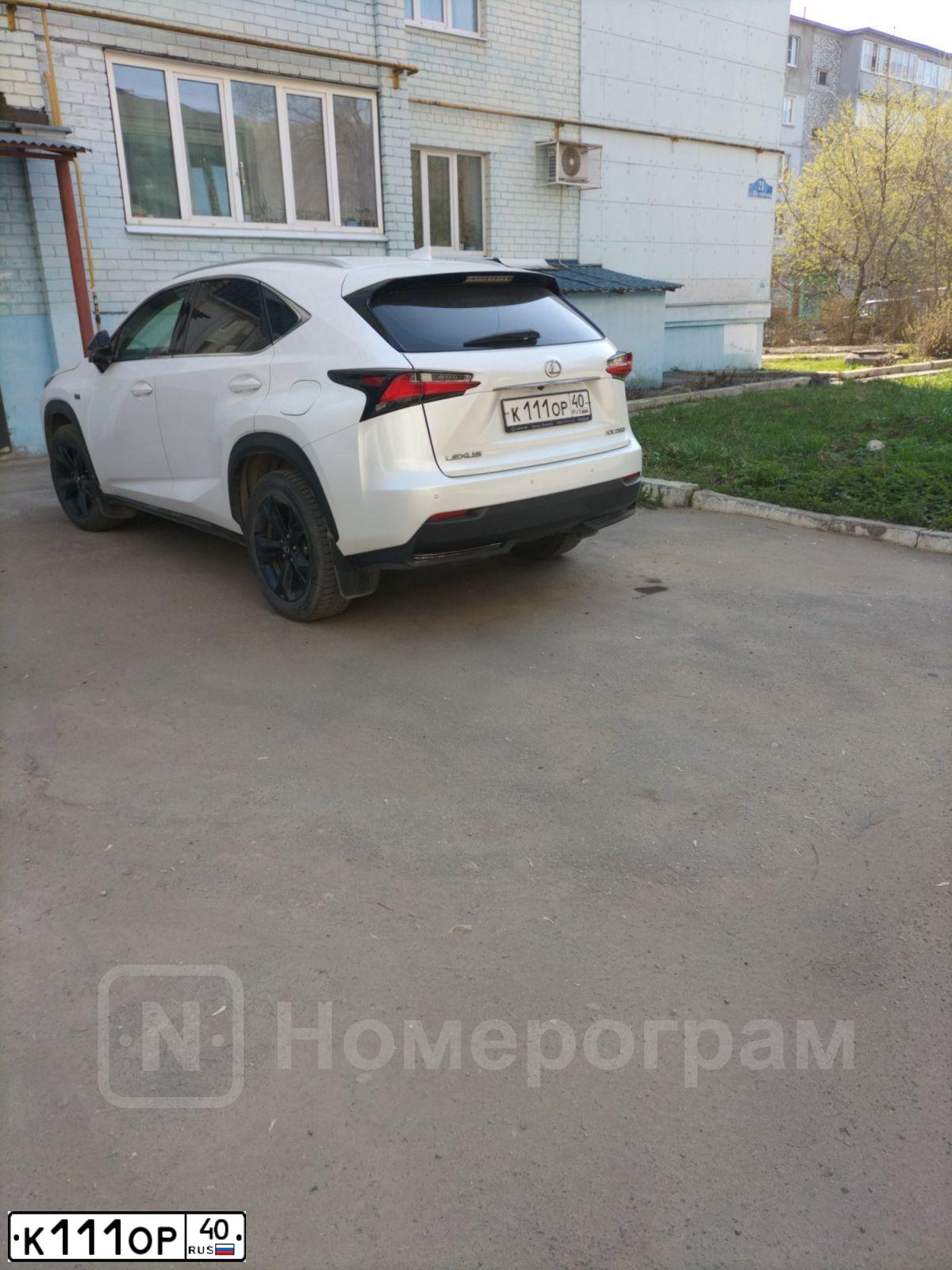 Фото автомобиля HOWO ZZ 3317, 2006 — госномер К111ОР40. Цвет: Красный