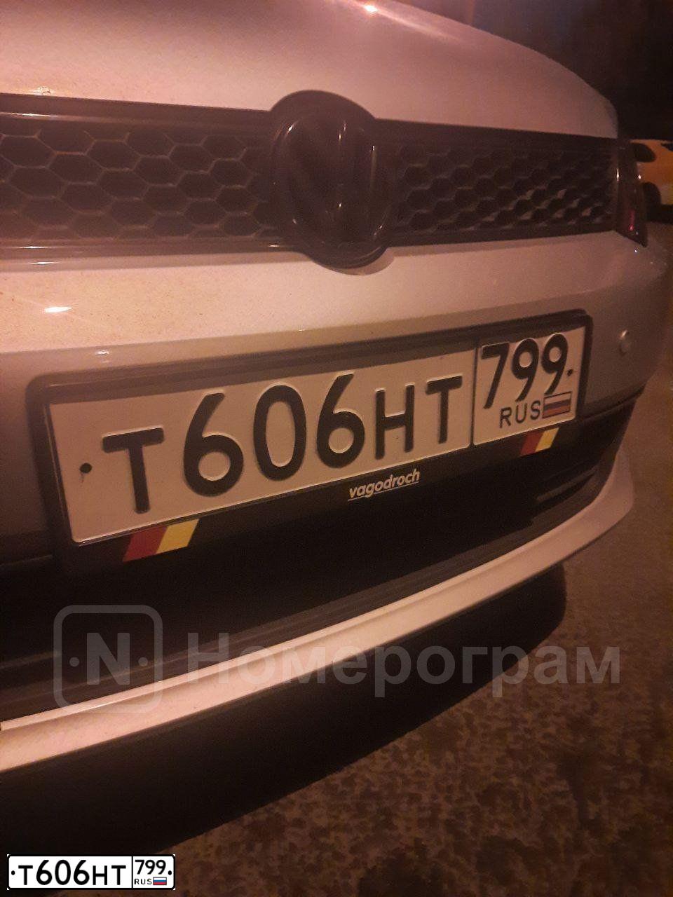 Фото автомобиля GEELY ATLAS, 2019 — госномер Т606НТ799. Цвет: ЧЕРНЫЙ