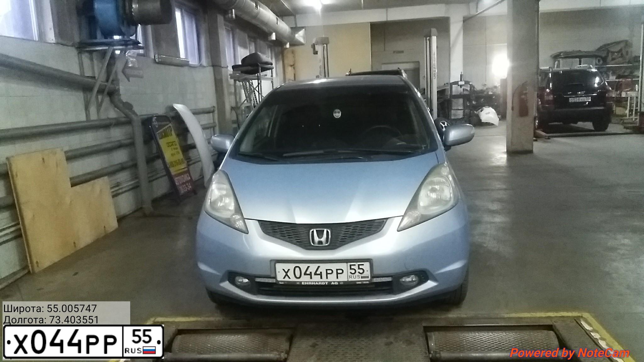 Фото автомобиля HONDA JAZZ, 2009 — госномер Х044РР55. Цвет: голубой