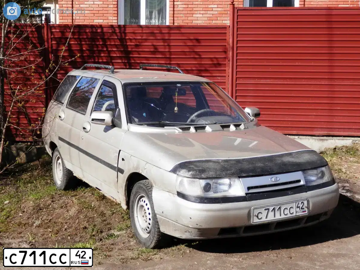 Фото автомобиля LADA 2111, 2000 — госномер С711СС42. Цвет: СЕРЕБРИСТО-ЗОЛОТОЙ