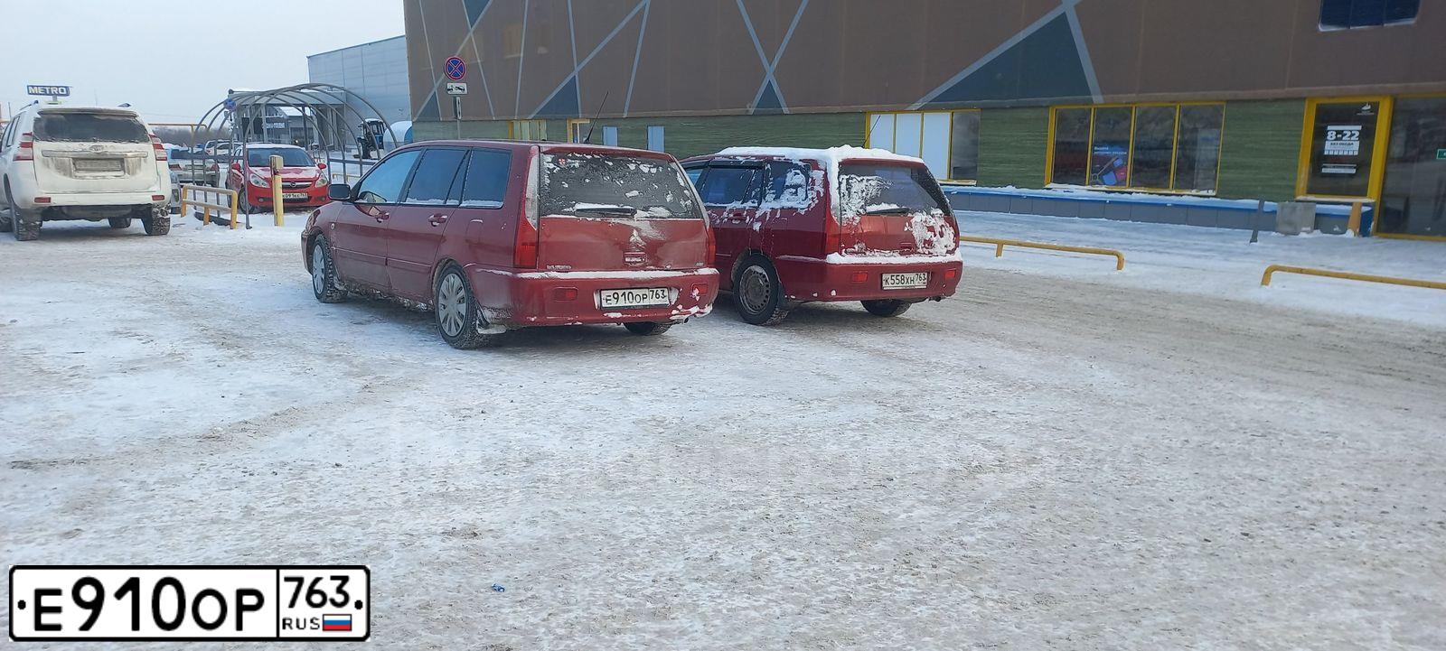 Фото автомобиля MITSUBISHI LANCER, 2006 — госномер Е910ОР763. Цвет: Красный