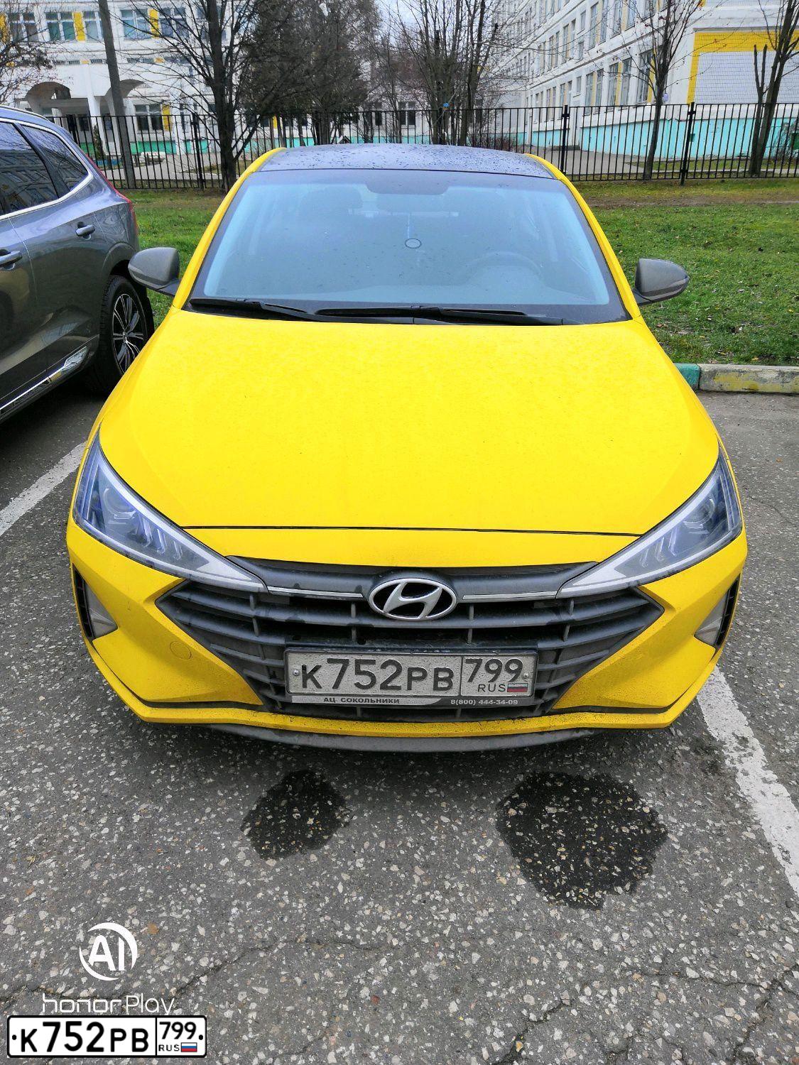 Фото автомобиля HYUNDAI ELANTRA, 2019 — госномер К752РВ799. Цвет: ЖЕЛТЫЙ