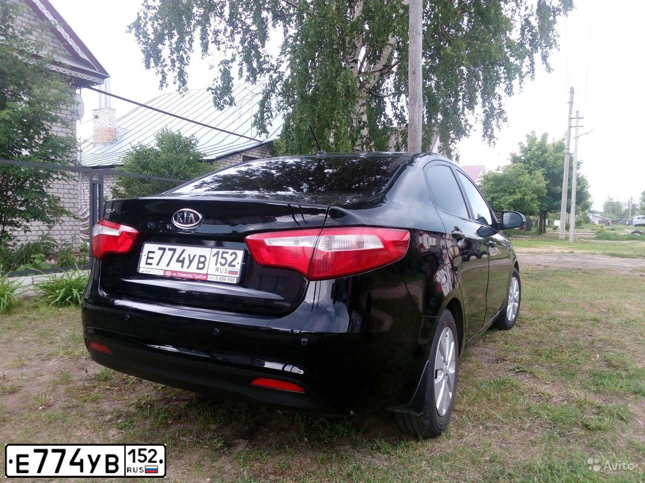 Фото автомобиля KIA RIO, 2011 — госномер Е774УВ152. Цвет: ЧЕРНЫЙ