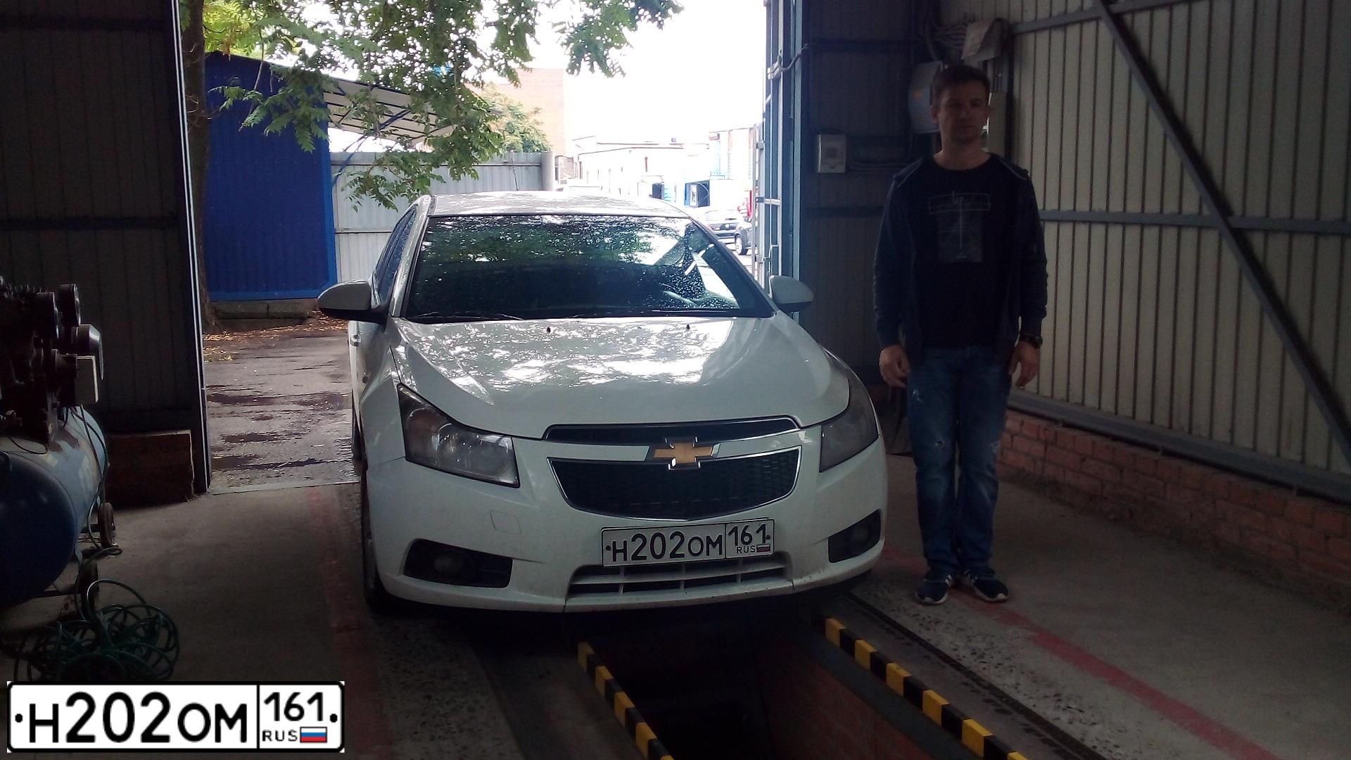 Фото автомобиля CHEVROLET CRUZE, 2012 — госномер Н202ОМ161. Цвет: Белый