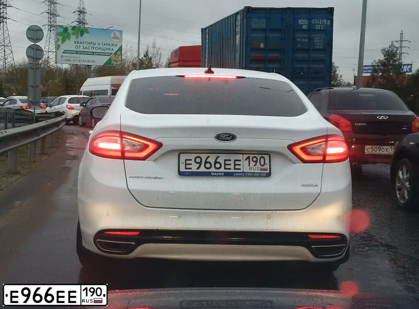 Фото автомобиля FORD FOCUS, 2006 — госномер Е966ЕЕ190. Цвет: ЧЕРНЫЙ