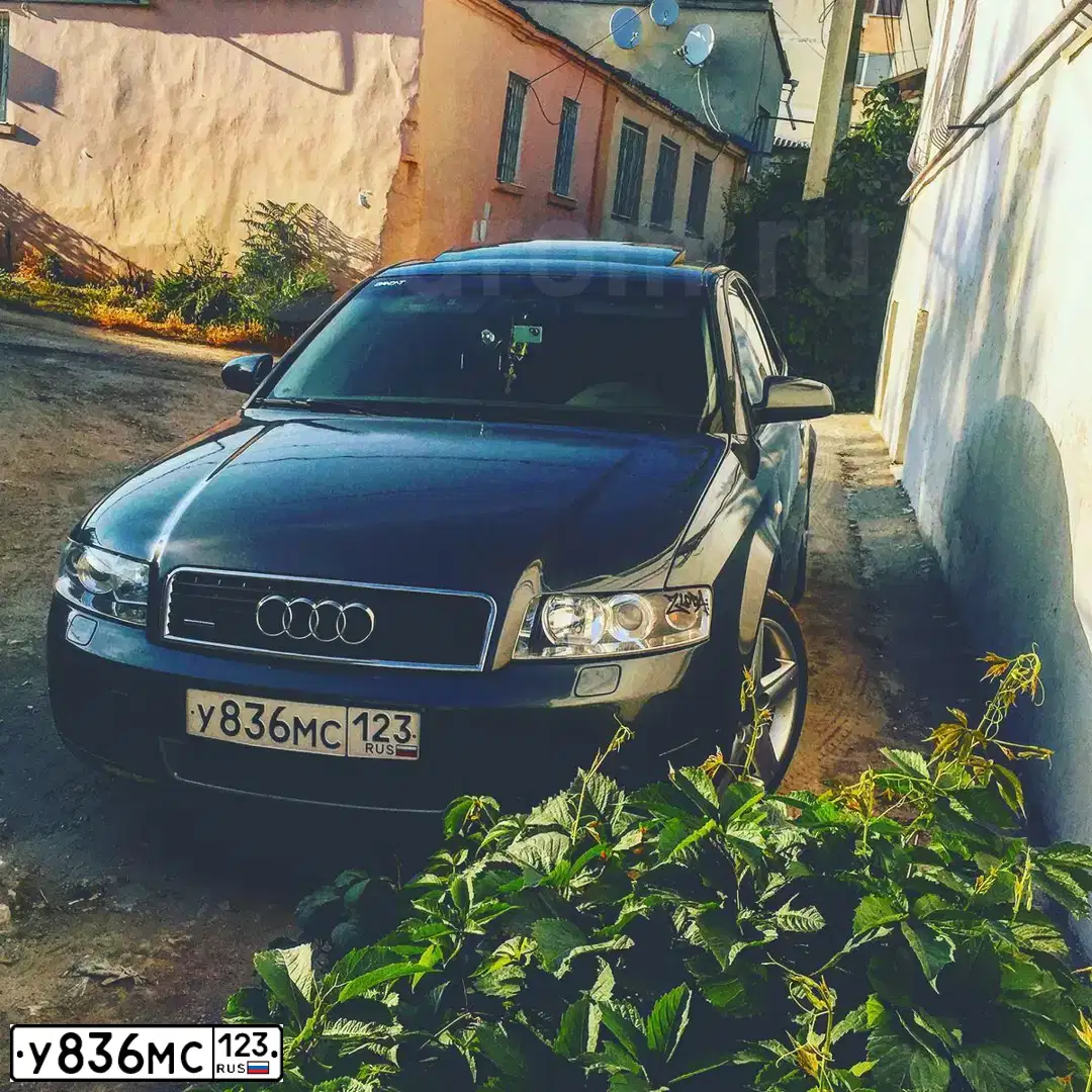 Фото автомобиля AUDI A4, 2002 — госномер М303ТТ134. Цвет: Серый
