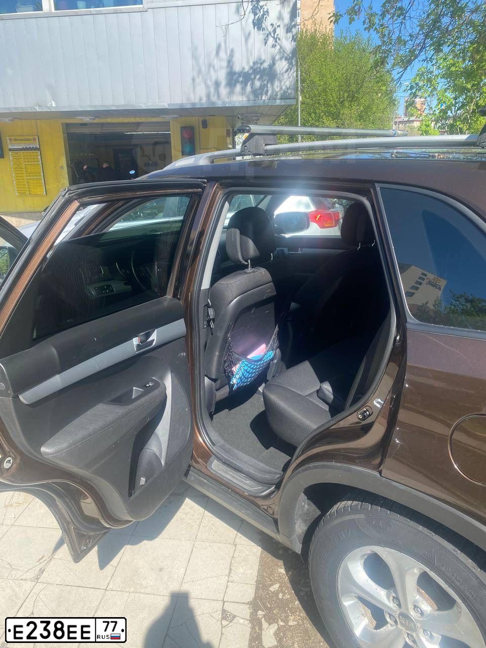 Фото автомобиля KIA SORENTO, 2013 — госномер В158УК790. Цвет: Коричневый