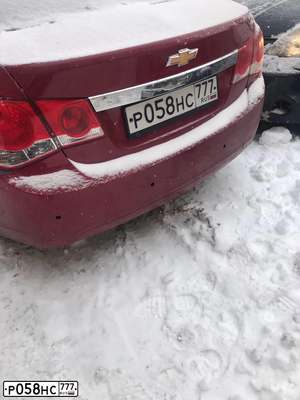 Фото автомобиля CHEVROLET CRUZE, 2010 — госномер Х497РР797. Цвет: Красный