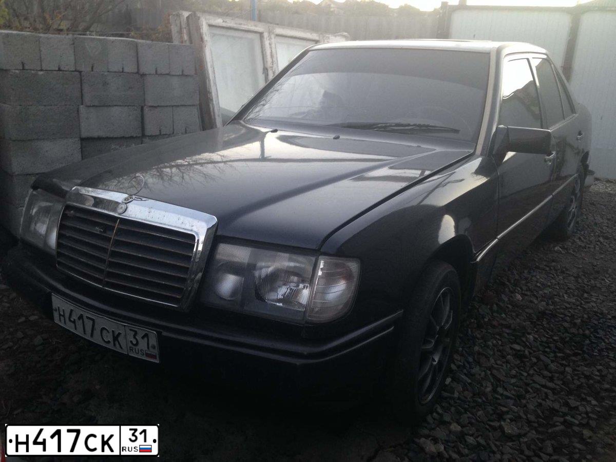 Фото автомобиля MERCEDES E-KLASSE, 1991 — госномер Е003ВС31. Цвет: ТЕМНО СЕРЫЙ