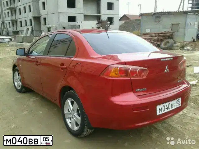 Фото автомобиля MITSUBISHI LANCER, 2007 — госномер М040ВВ05. Цвет: Красный